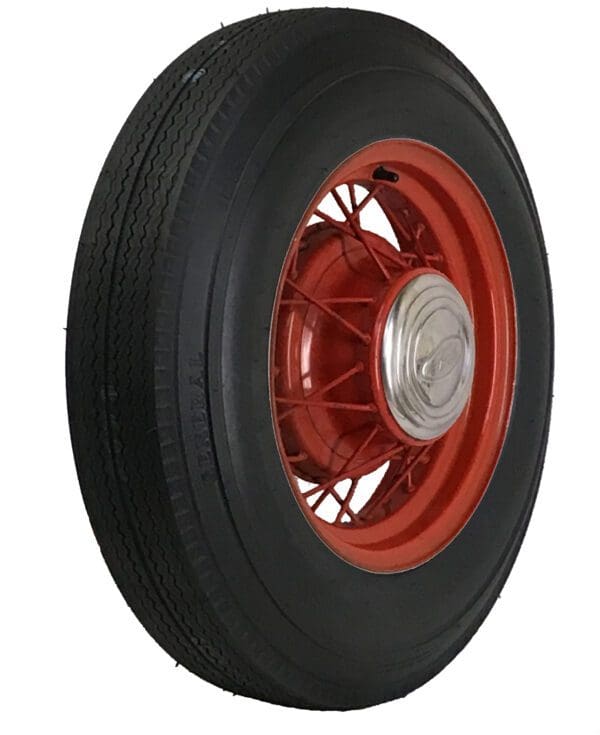 A tire with a red rim on a white background.