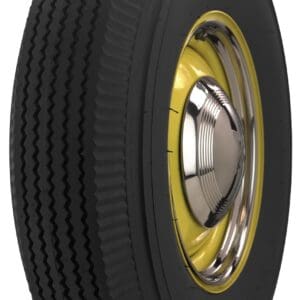 A black and yellow tire on a white background.