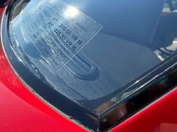 Tire Pressure Sticker on a Ferrari 308 GTB QV 
