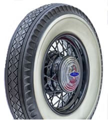 Classic Bedford 750-17 3-3/4' WW car tire with a white sidewall and wire-spoked wheel, showing a detailed view of the treads and hubcap.