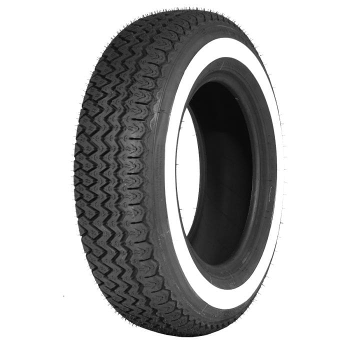 A single black car tire, 185HR15 Michelin XVS 1.5" WW with a detailed tread pattern and 1.5" white sidewall, shown on a white background.