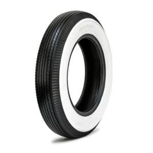 Black tire with white sidewall, isolated.